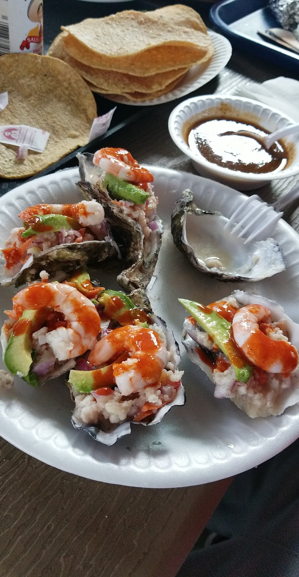Printed menu with seafood categories and specials.
